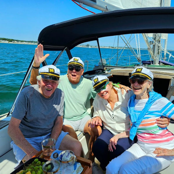 Four guests in captain hats